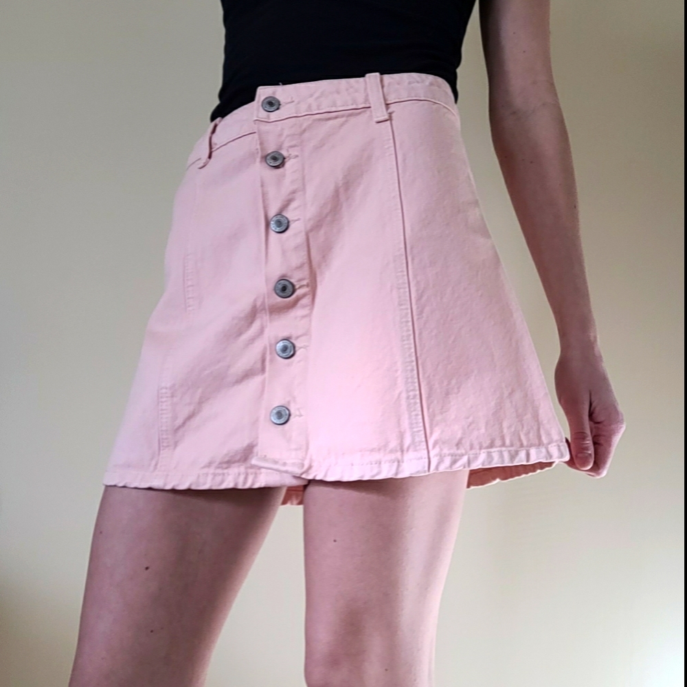 Light pink denim mini skirt